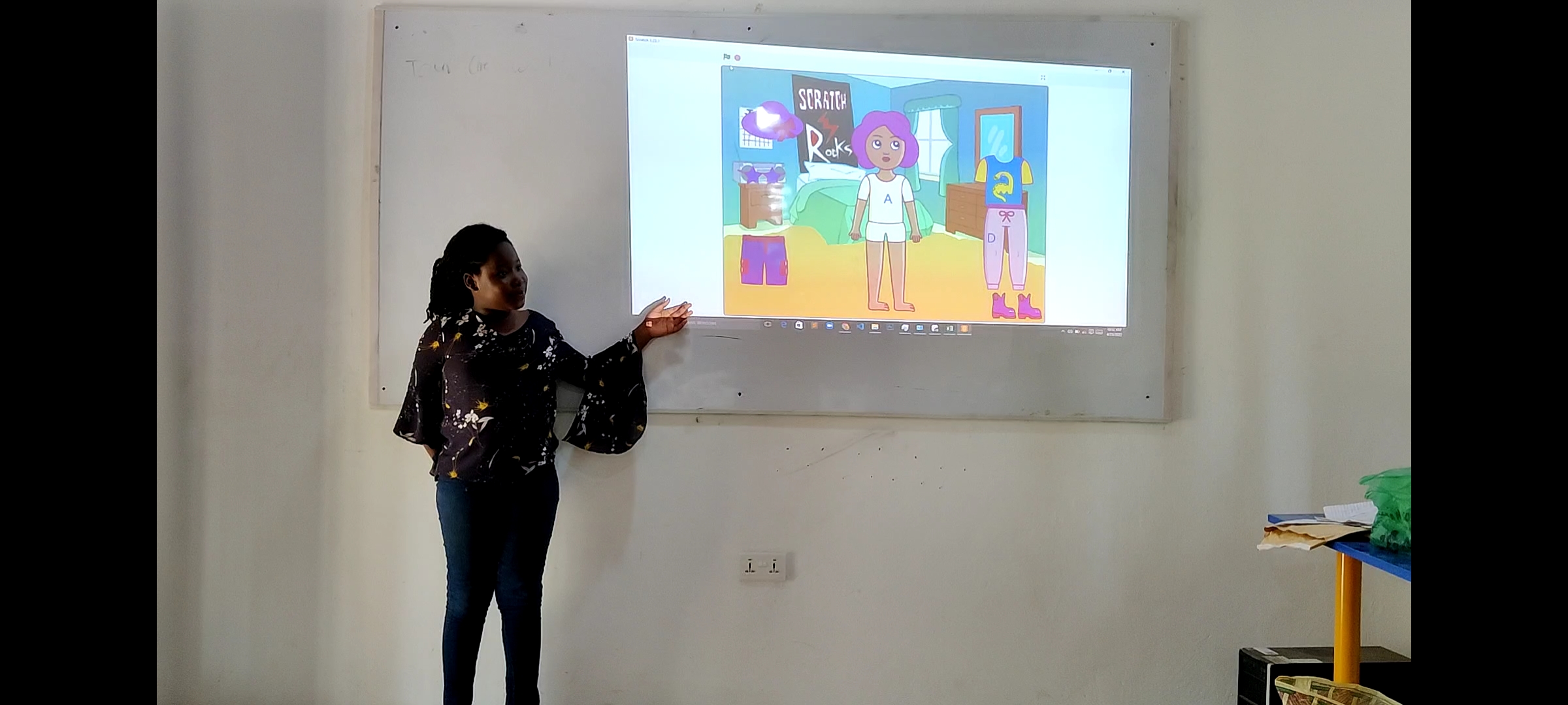 Female student presenting her project